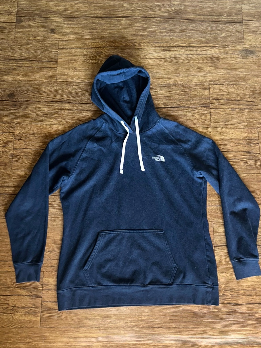 The North Face Navy Pullover Hoodie with White Drawstrings